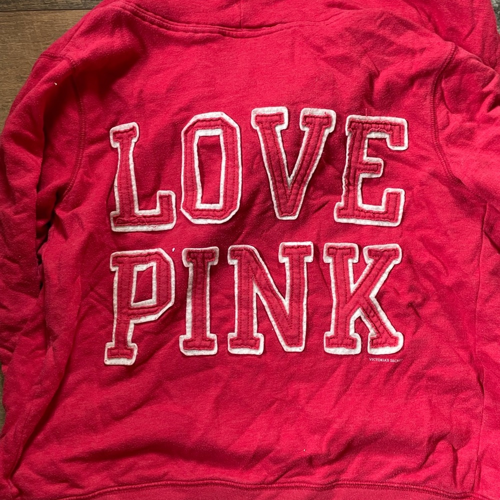 Pink zip-up jacket with hood